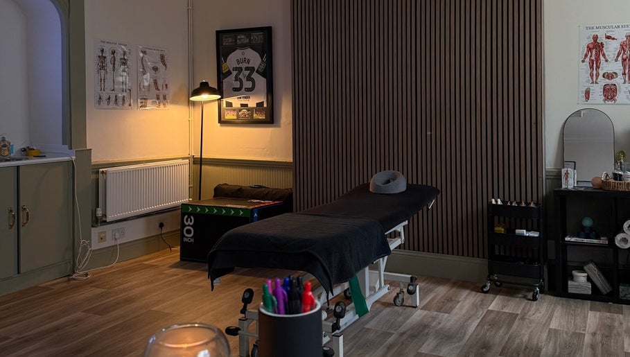 Relaxing therapy room at MD Sport & Exercise Therapy, Berwick-upon-tweed, England, GB, featuring massage table.