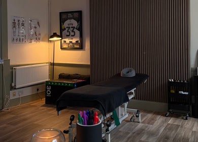 Relaxing therapy room at MD Sport & Exercise Therapy, Berwick-upon-tweed, England, GB, featuring massage table.