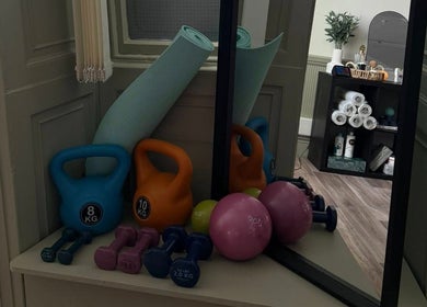 Dumbbells, kettlebells, and yoga mat at MD Sport & Exercise Therapy in Berwick-upon-Tweed, England, GB.