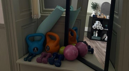 Dumbbells, kettlebells, and yoga mat at MD Sport & Exercise Therapy in Berwick-upon-Tweed, England, GB.