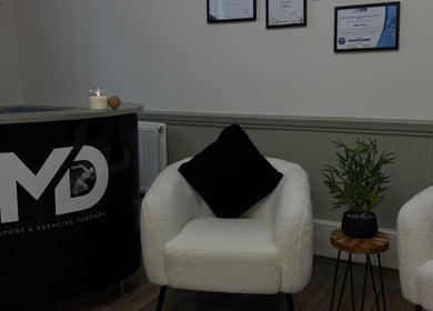 Inviting MD Sport & Exercise Therapy reception with plush chairs in Berwick-upon-tweed, England, GB.
