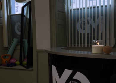 MD Sport & Exercise Therapy studio reception in Berwick-upon-tweed featuring fitness equipment and calming ambiance.