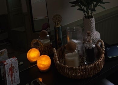 A relaxing corner at MD Sport & Exercise Therapy, Berwick-upon-tweed, England, GB with candles and decor.