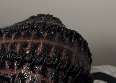 Intricately braided hairstyle at LH/ By Leslie Hair, Pau, Nouvelle-aquitaine, FR.