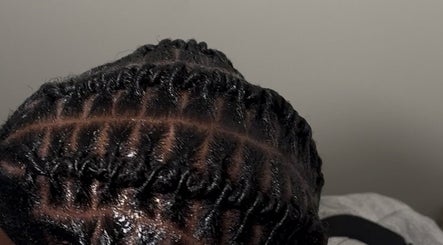 Intricately braided hairstyle at LH/ By Leslie Hair, Pau, Nouvelle-aquitaine, FR.