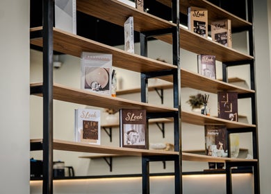 Modern bookshelf display at Sleek Care, Riyadh, Riyadh Province, SA with care products and decor.