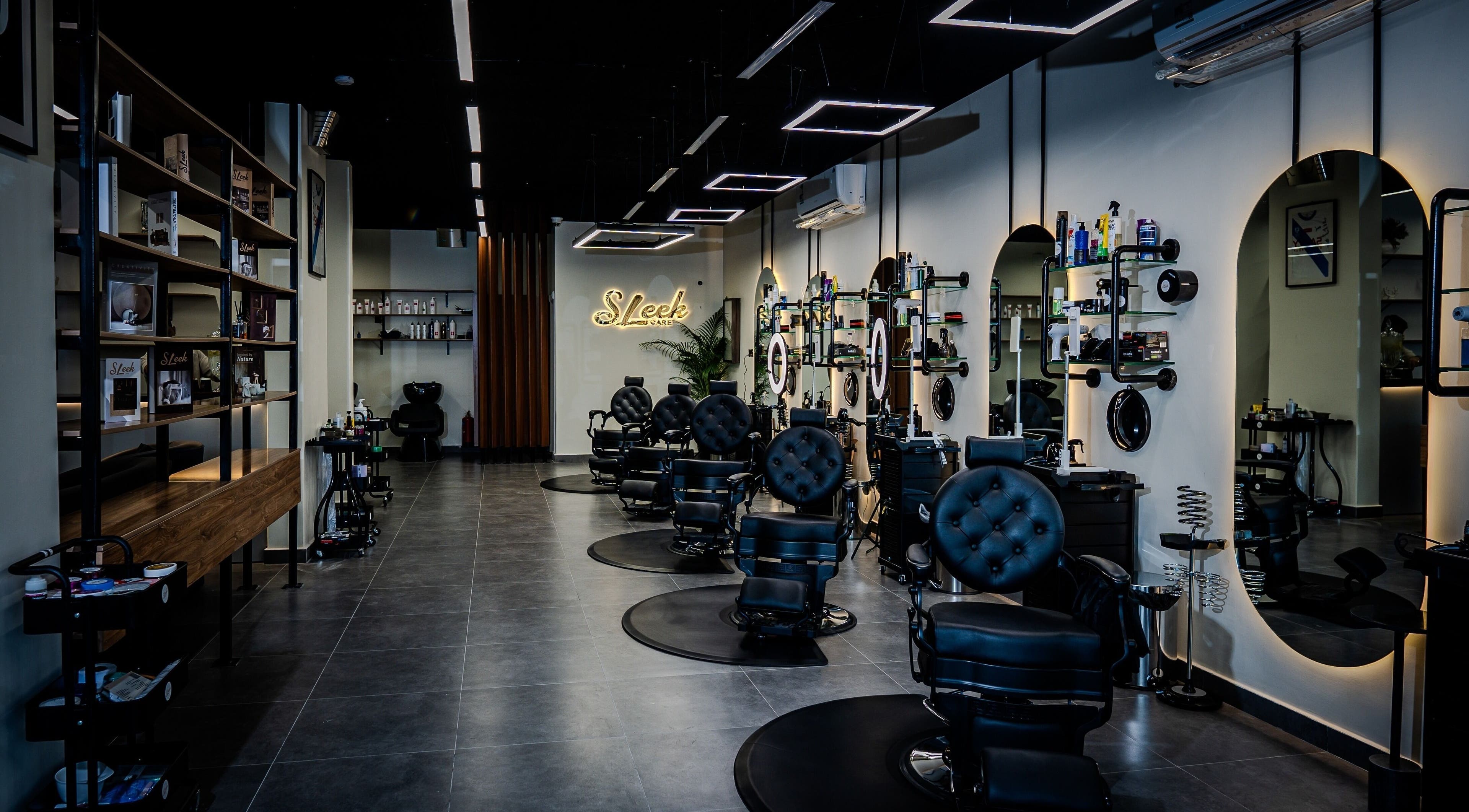 Modern salon interior at Sleek Care in Riyadh, Riyadh Province, SA featuring stylish decor and comfy chairs.
