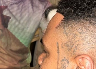 Close-up of a stylish haircut at Payso Cuts in New York, New York, US, showcasing precise fade detailing.