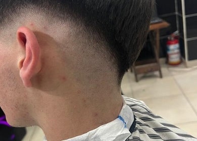Perfil de corte de cabello moderno en Spartanos Barber, Buenos Aires, Ciudad Autónoma De Buenos Aires, AR.