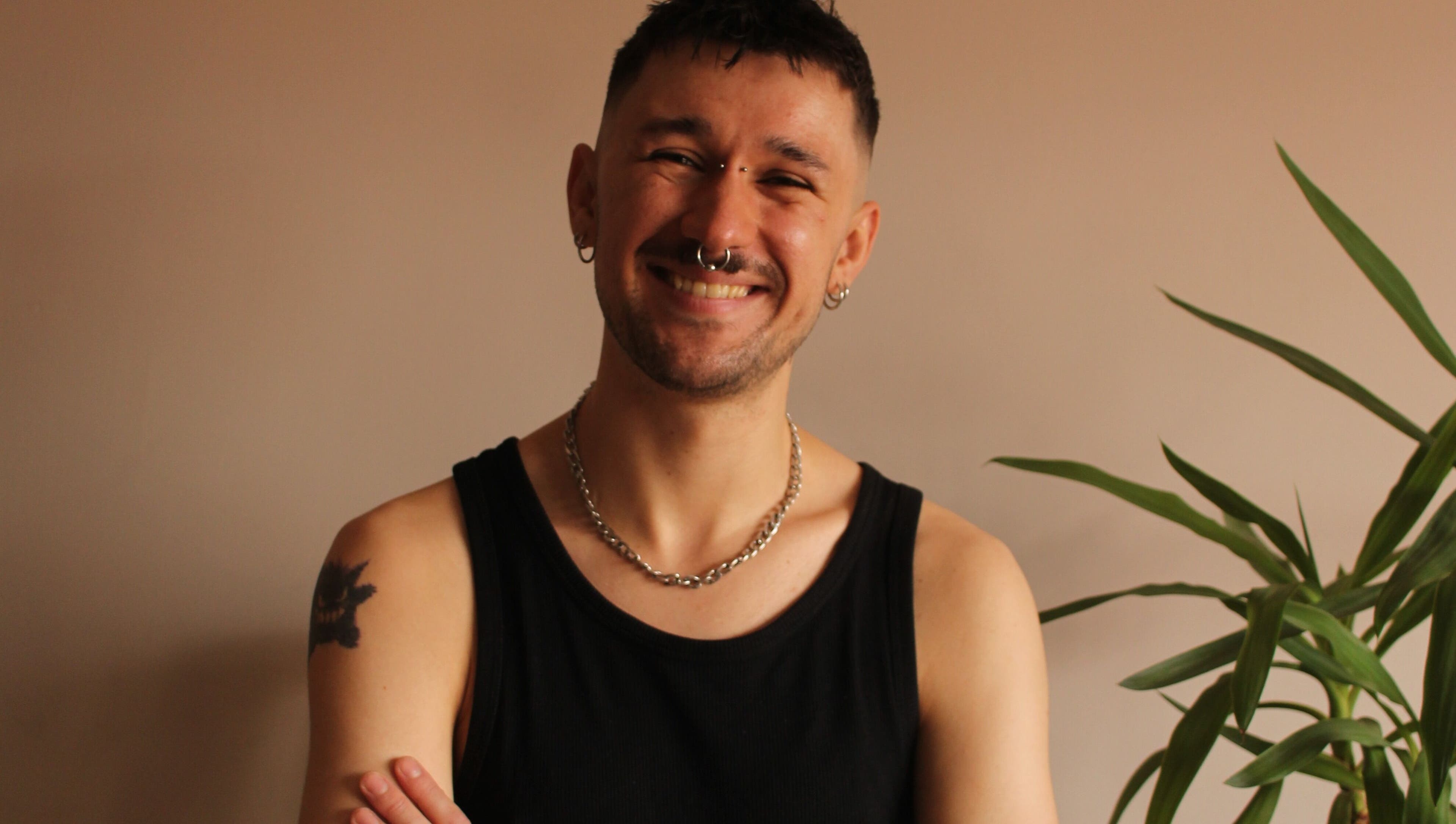 Relaxed individual smiling at Massage by Sam, Stourbridge, England, GB.