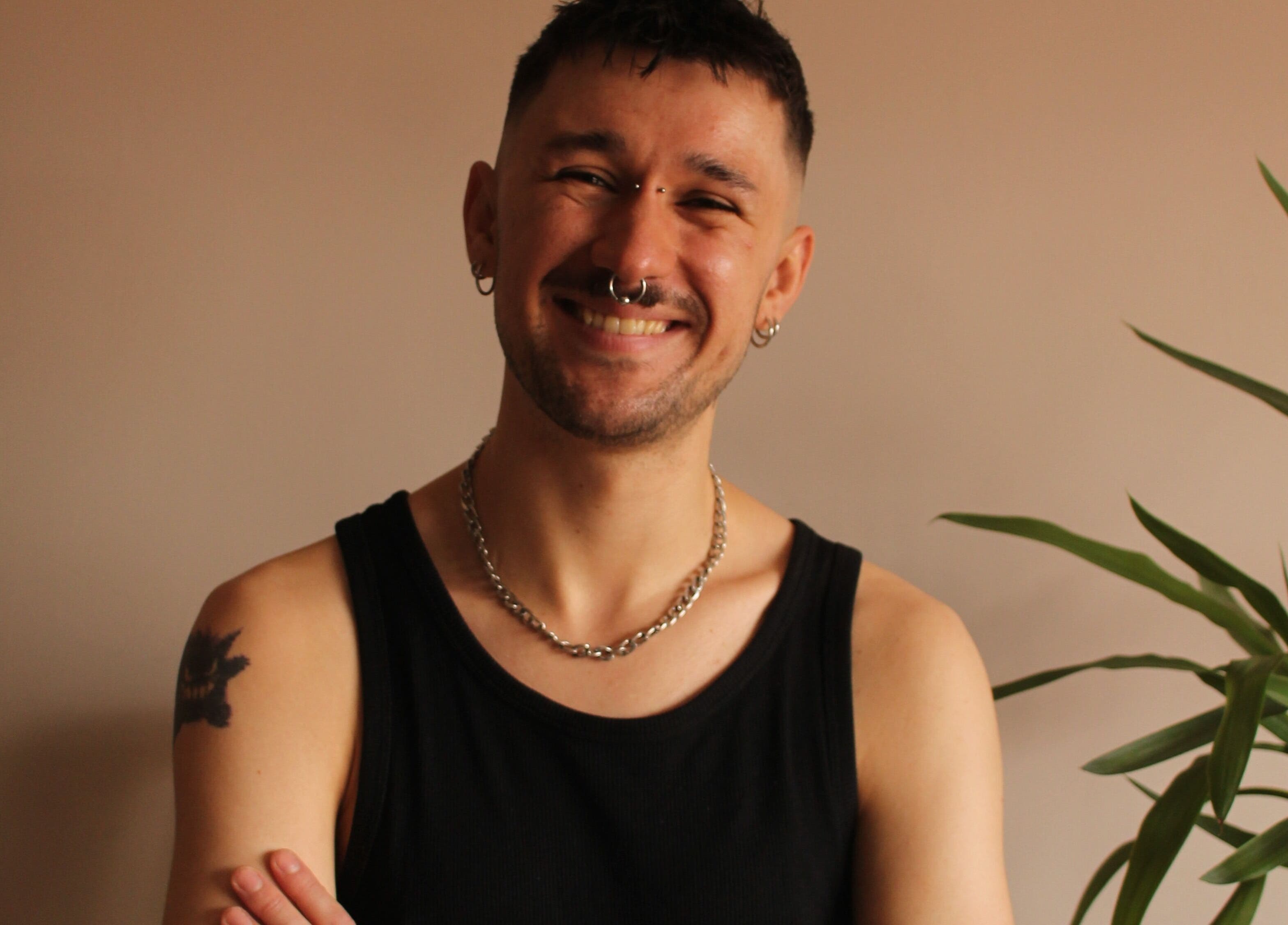 Relaxed individual smiling at Massage by Sam, Stourbridge, England, GB.