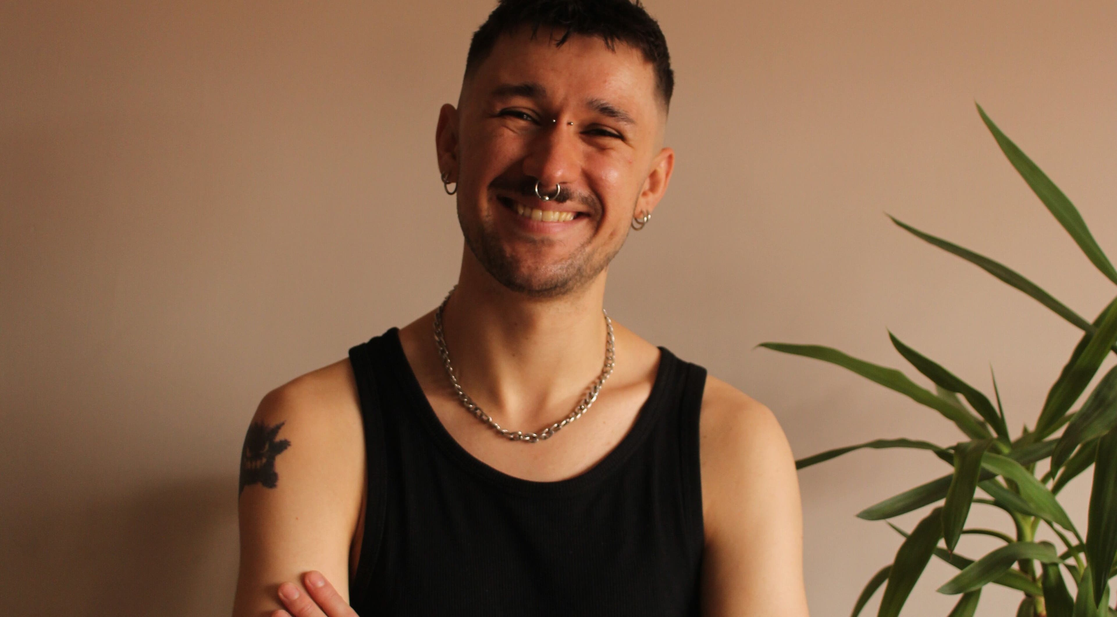 Relaxed individual smiling at Massage by Sam, Stourbridge, England, GB.