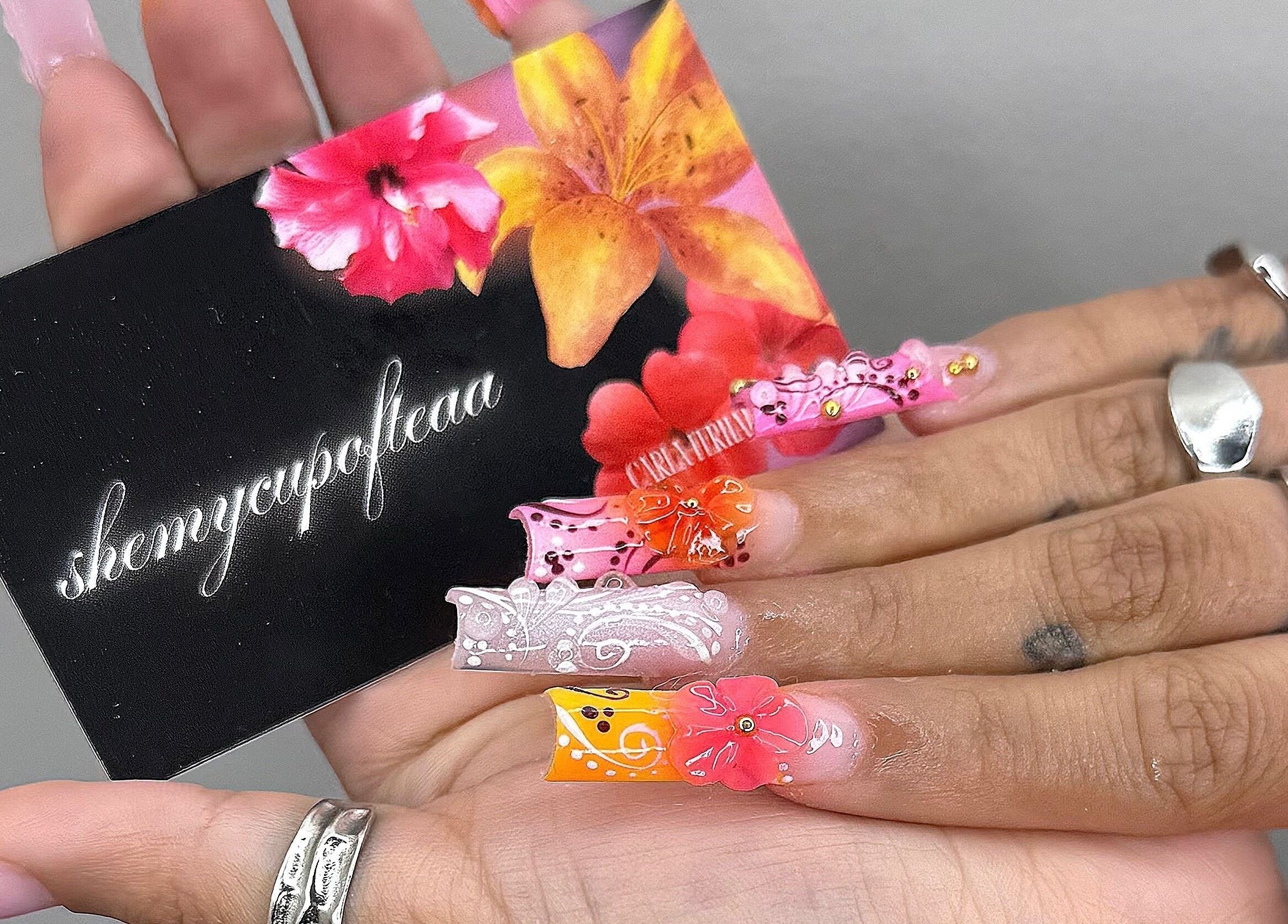 Vibrant floral nail art by SHEMYCUPOFTEAA, located in Round Lake, Illinois, US. Colorful and intricate design.