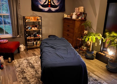 Cozy massage room at Falling Waters Massage, Mad Lasher Studio, Wilmington, North Carolina, US.