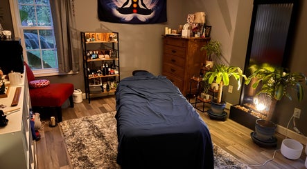 Cozy massage room at Falling Waters Massage, Mad Lasher Studio, Wilmington, North Carolina, US.