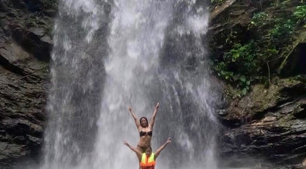 Visitors enjoying a waterfall experience at 4K Adventures and Tours in Diego Martin, Diego Martin Regional Corporation, TT.