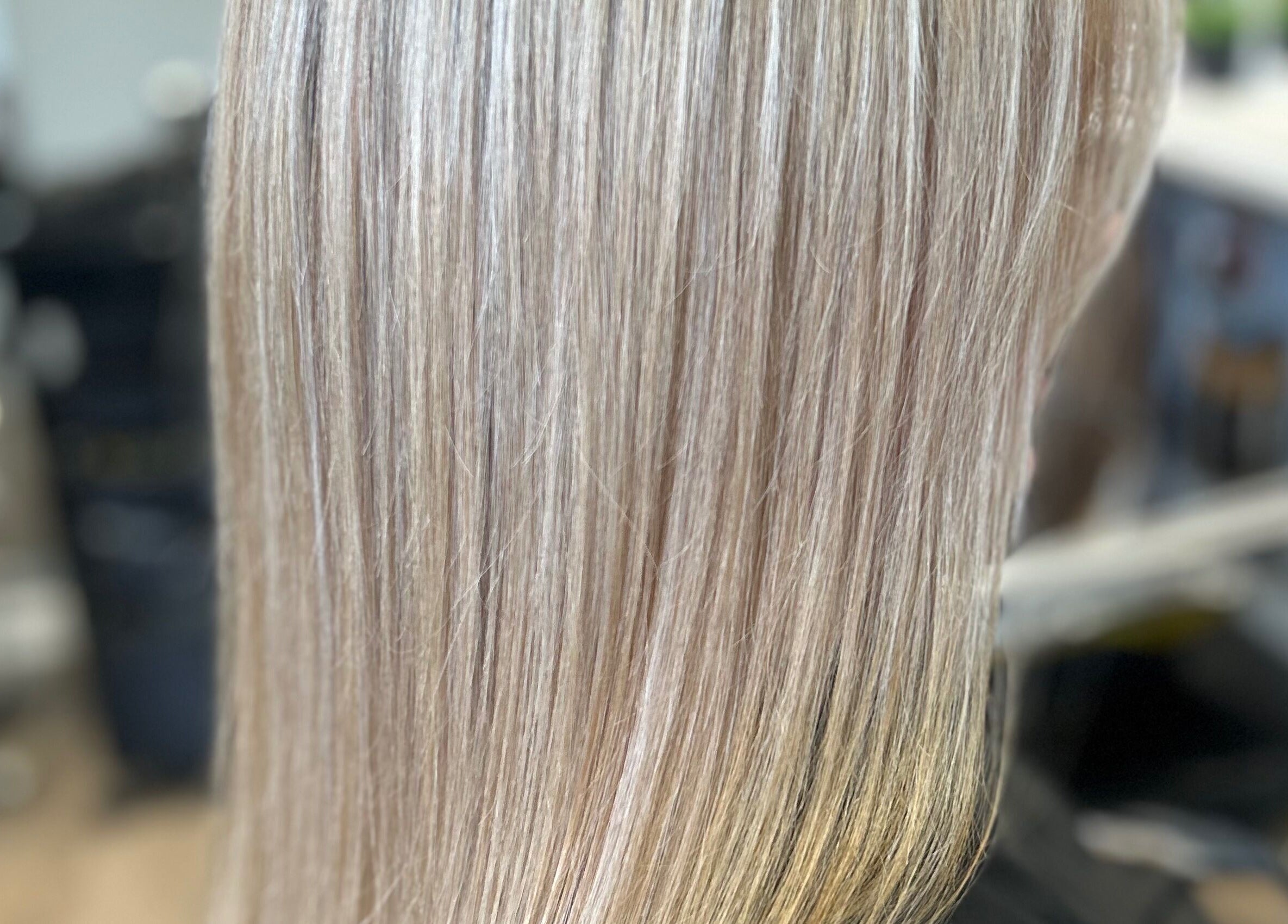 Blonde hair transformation at EmmaJane Hairdressing, Cardross, Scotland, GB showcasing sleek smooth finish.