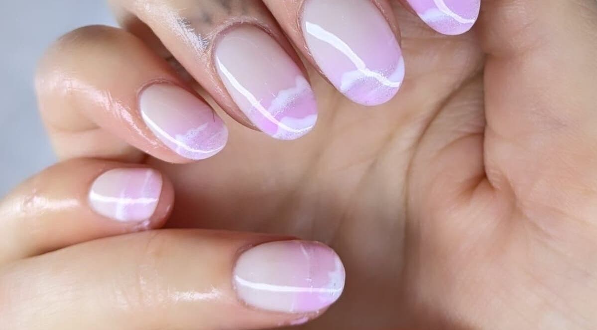 Elegant pastel pink nails at THE DOLL HOUSE NAILS, Bristol, England, GB showcasing stylish manicure.