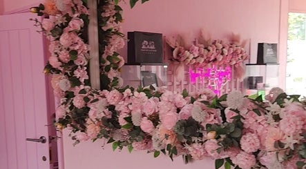 Elegant pink floral decor at Facecard_ap, Purley, England, GB enhancing beauty and wellness experience.