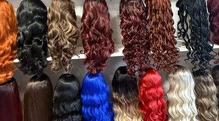 Diverse wigs on display at Johanna Wigs, Hamilton, Ontario, CA. Explore vibrant styles and textures.