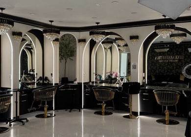 Luxurious interior of Armstyle beauty lounge in Glendale, California, US, featuring elegant chandeliers and mirrors.
