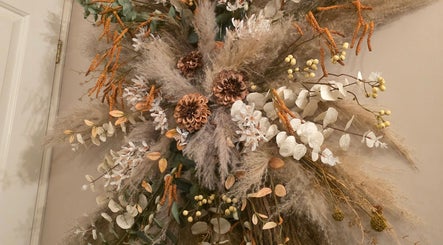 Elegant floral display at Moss & Mane by Jessie Gregory, Stourbridge, England, GB, featuring dried blooms.