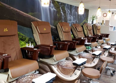 Luxurious pedicure chairs at Quality Nails Spa in Hingham, MA, US offer relaxation and style.