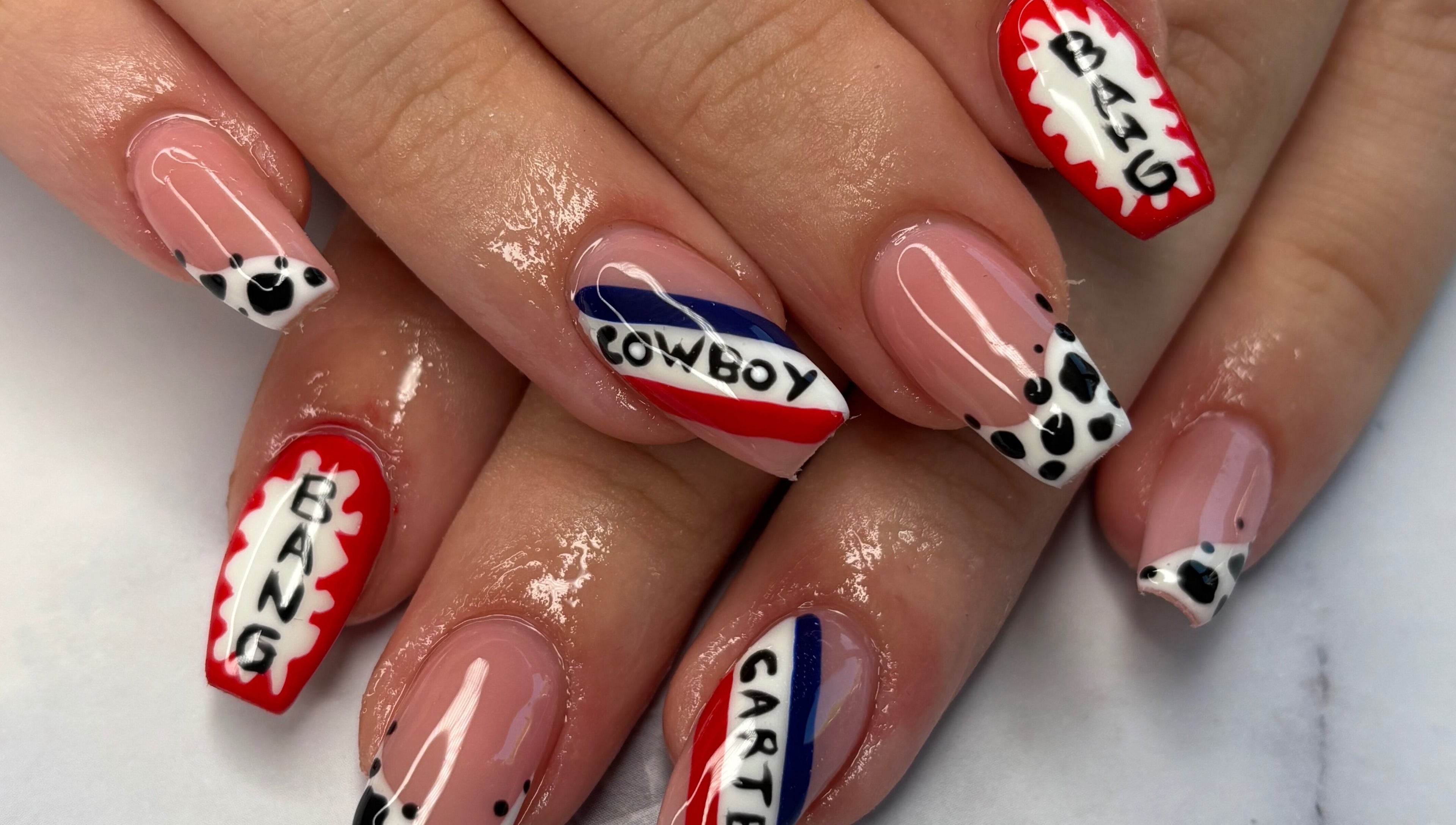 Unique nail art design with bold lettering at Nails By Maisie, South Woodham Ferrers, England, GB.