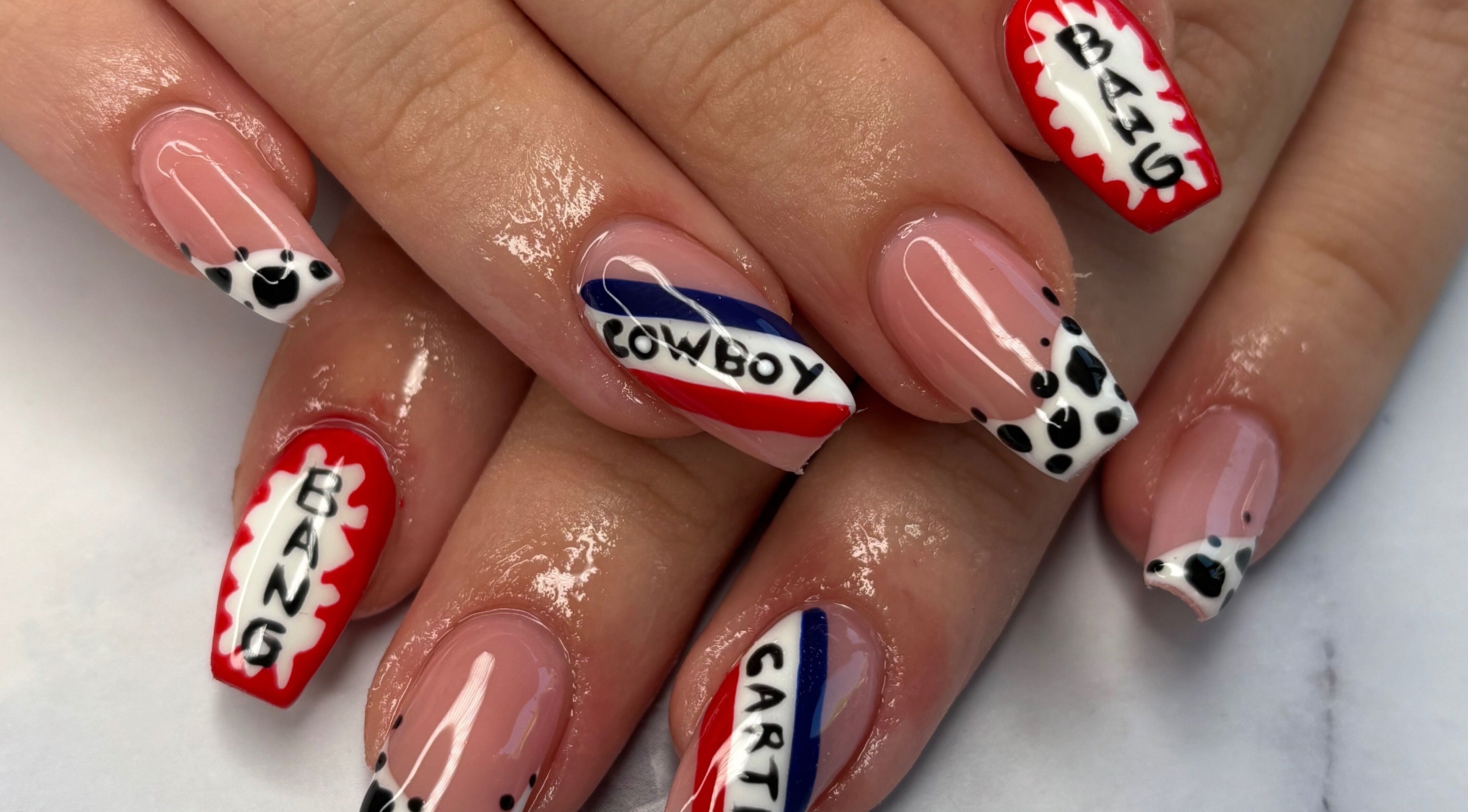 Unique nail art design with bold lettering at Nails By Maisie, South Woodham Ferrers, England, GB.