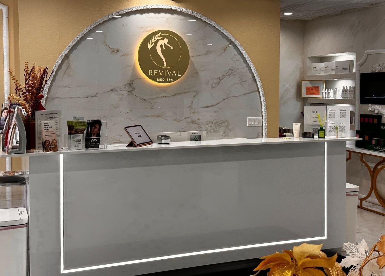 Elegant reception at Revival Med Spa And Salon Inc, Huntington, New York, US with marble decor.