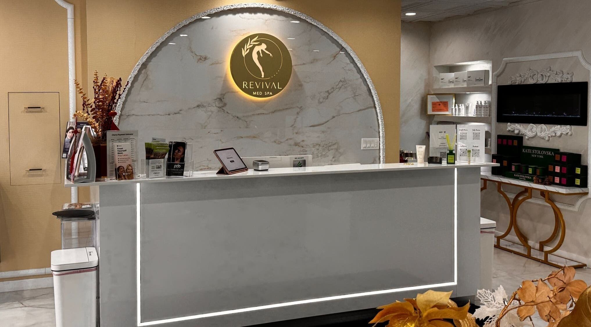 Elegant reception at Revival Med Spa And Salon Inc, Huntington, New York, US with marble decor.