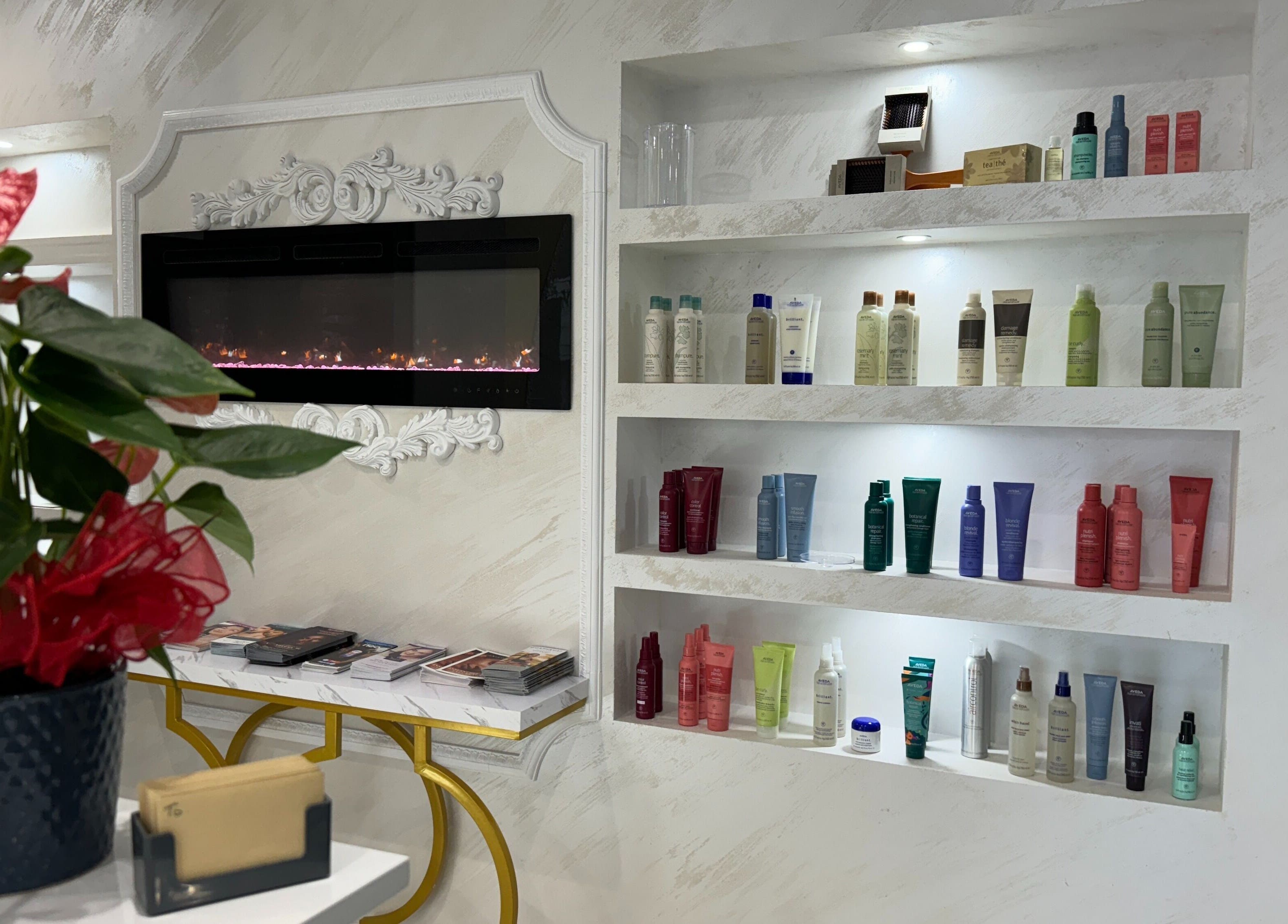 Product shelves at Revival Med Spa And Salon Inc, Huntington, New York, US, showcasing a variety of beauty products.