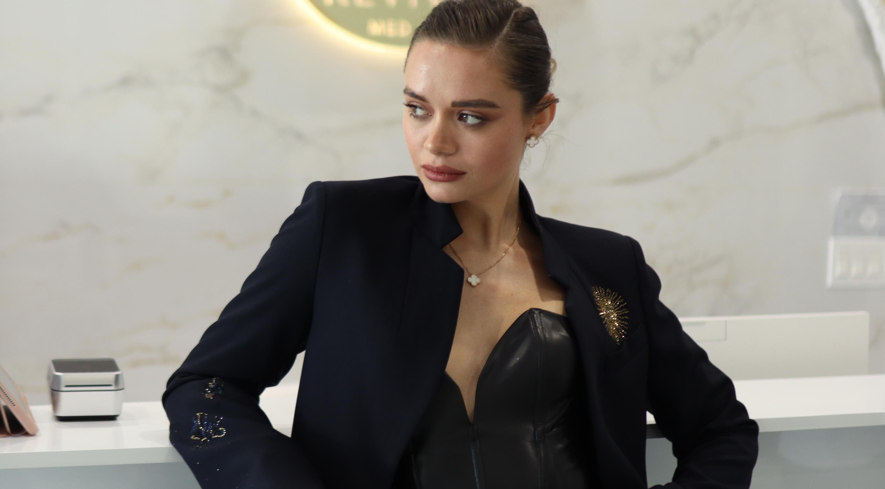 Sophisticated woman at Revival Med Spa And Salon Inc, Huntington, New York, US. A chic and welcoming atmosphere.