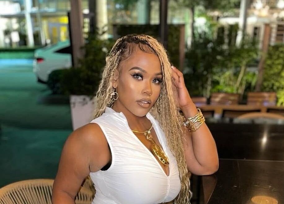 Stylish woman enjoying evening at Chic Luxury Hair Studio, Franklin Square, New York, US.