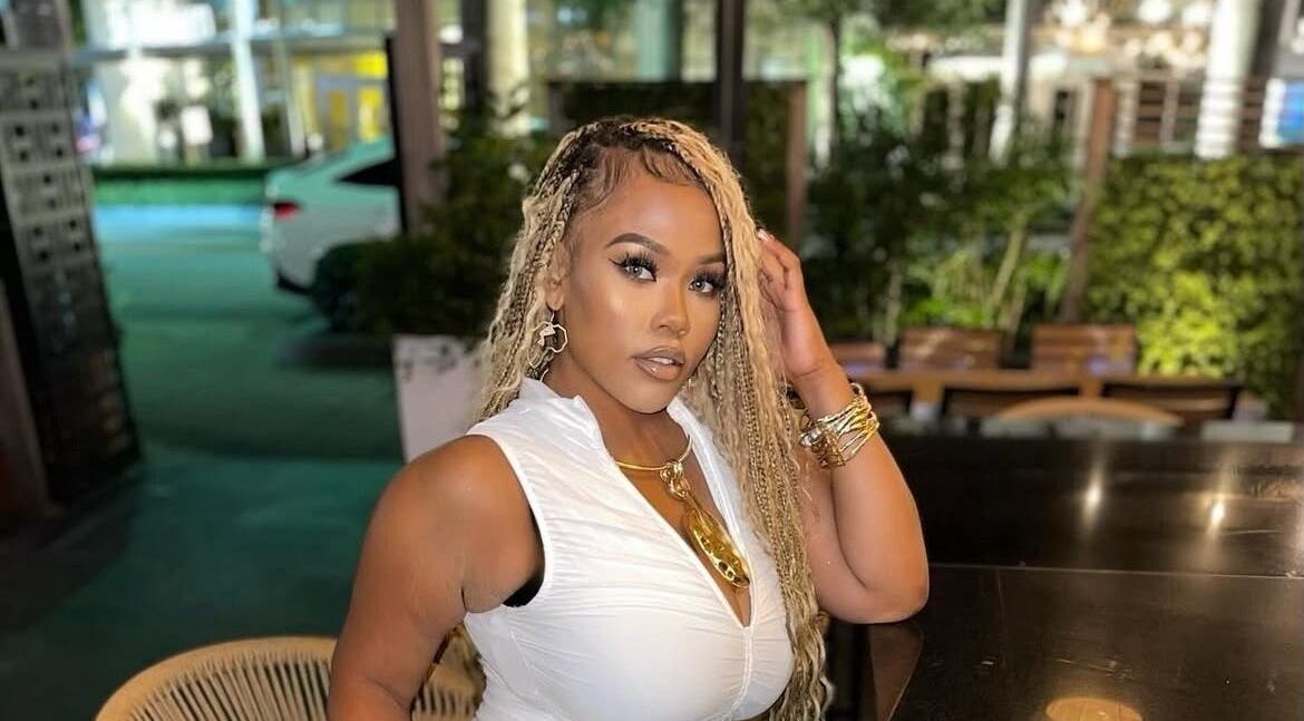 Stylish woman enjoying evening at Chic Luxury Hair Studio, Franklin Square, New York, US.