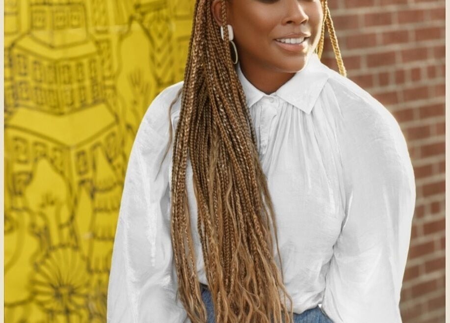 Woman with braided hairstyle at Chic Luxury Hair Studio, New York, New York, US.