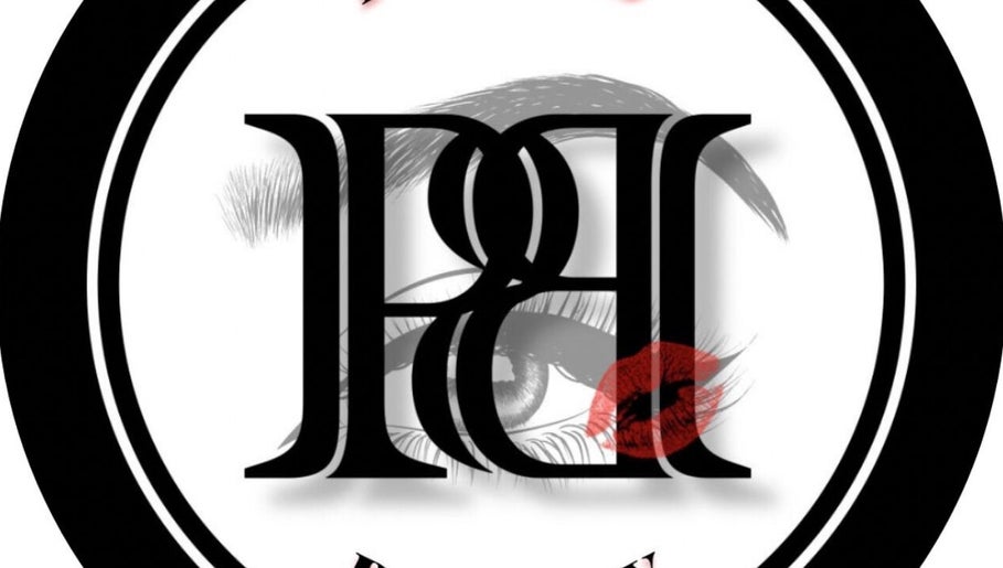 Poised Beauty logo featuring an eye and red lips, located in Sint Maarten, SX.
