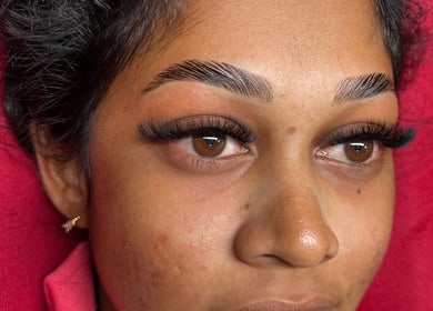 Close-up of eyelash extensions at Poised Beauty, Sint Maarten, SX, showcasing detailed lash work.