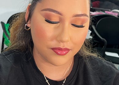 Makeup artistry at Poised Beauty, Sint Maarten, SX showcasing radiant glam look with flawless finish.