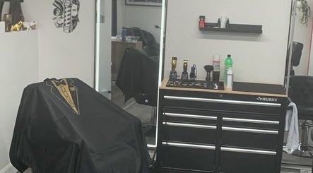 Interior of Barbershop Clandestin in Québec, Québec, CA showcasing grooming tools and a barber chair.