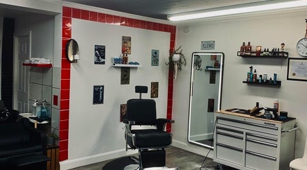 Interior of Barbershop Clandestin, Québec, Québec, CA featuring a stylish chair with grooming tools.
