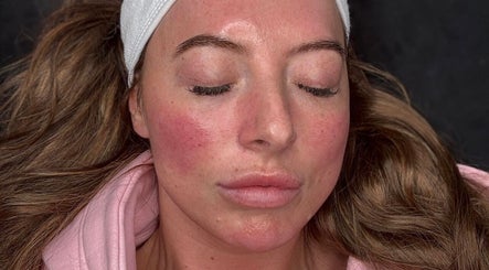 Client enjoying skincare session at Skin By Charlie, Sunderland, England, GB. Glowing skin with relaxation.