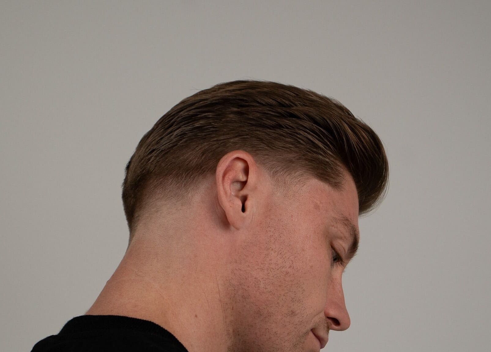 Sleek, modern haircut showcased at The Studio X, Maroubra, New South Wales, AU.