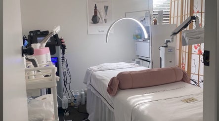 Tranquil treatment room at Fusion Skin Beauty West Auckland in Auckland, NZ equipped with modern wellness tools.