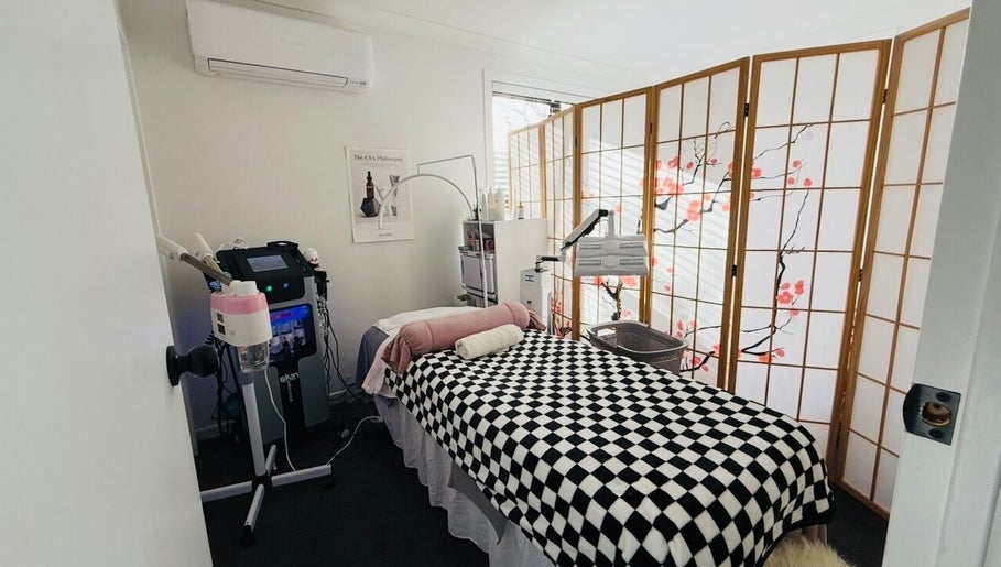 Relaxing spa room at Fusion skin beauty west Auckland, featuring a comfy bed, elegant decor, in Auckland, Auckland, NZ.