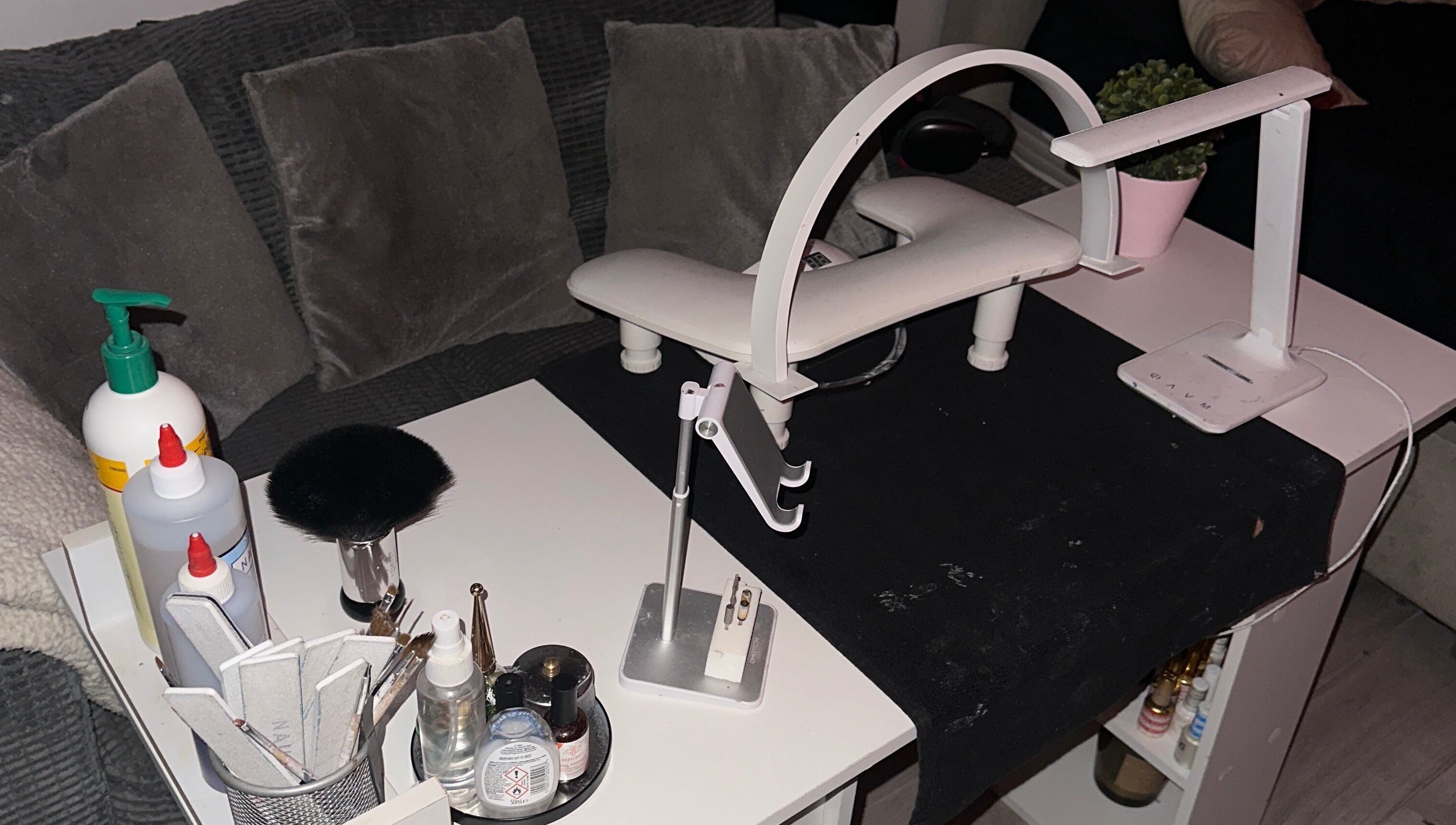 Nail care station at Klawedlondon, London, England, GB featuring tools and products for wellness services.