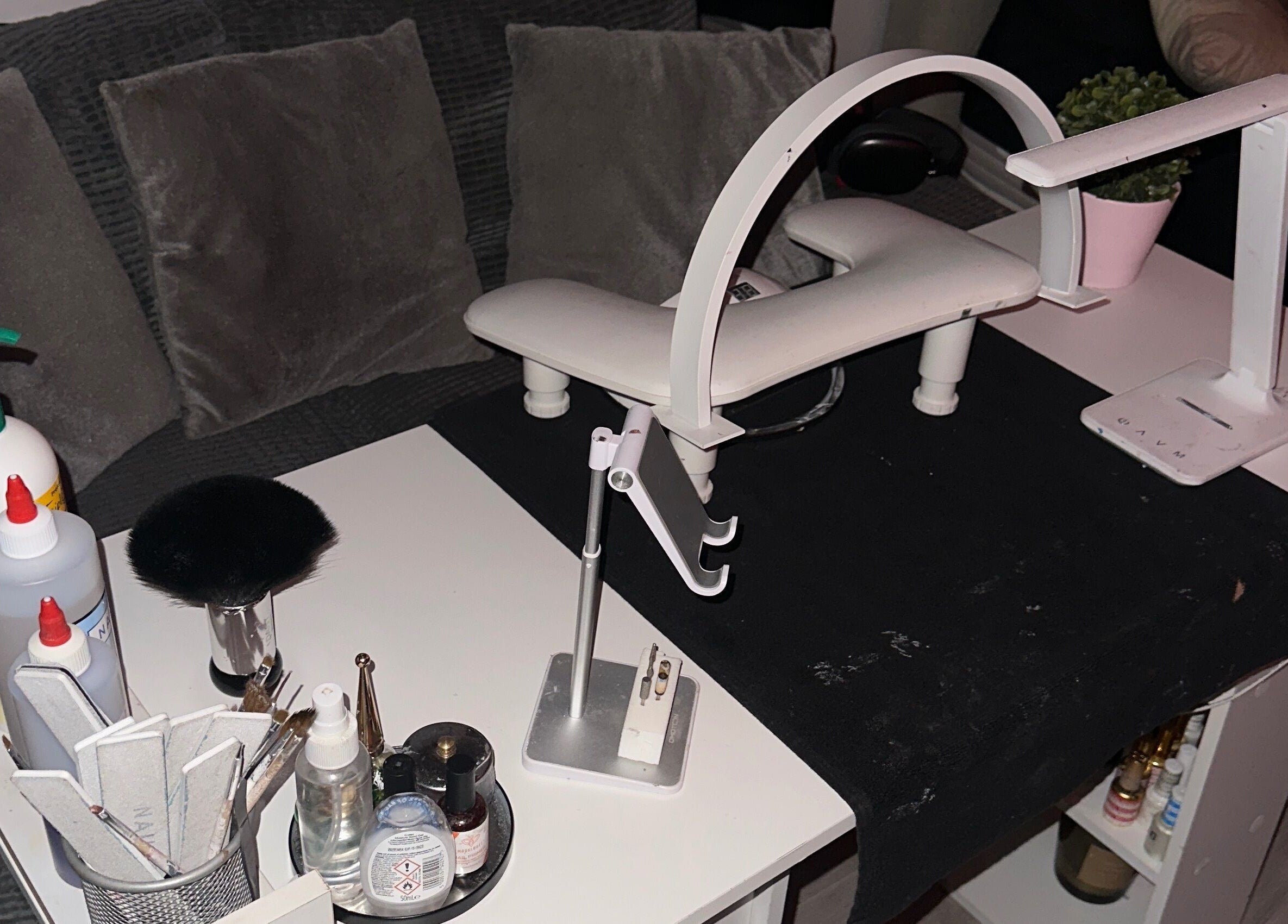 Nail care station at Klawedlondon, London, England, GB featuring tools and products for wellness services.