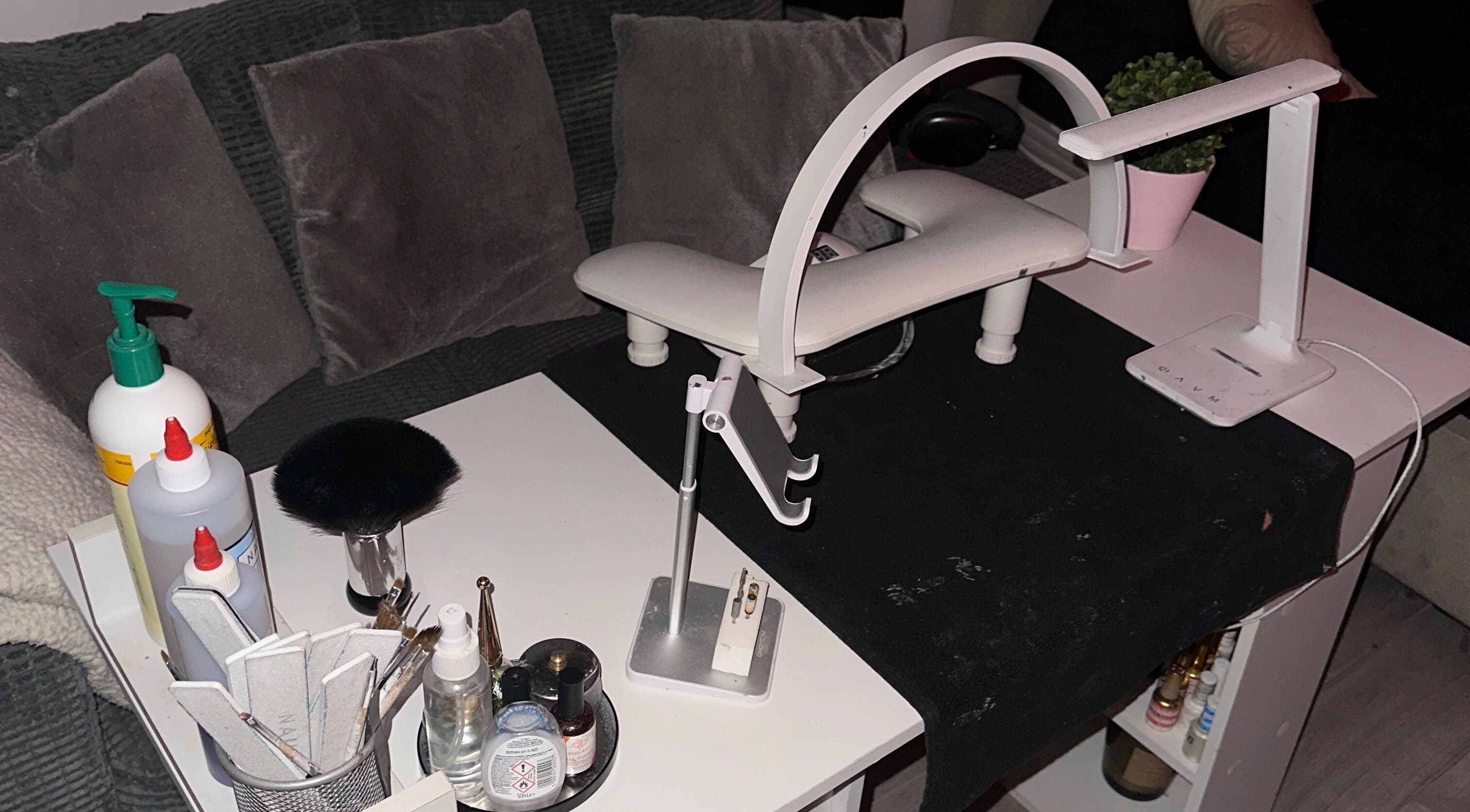 Nail care station at Klawedlondon, London, England, GB featuring tools and products for wellness services.