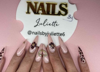 Chic nail art at Nails by Juliette in Melbourne, Victoria, AU featuring intricate designs on a pastel pink base.