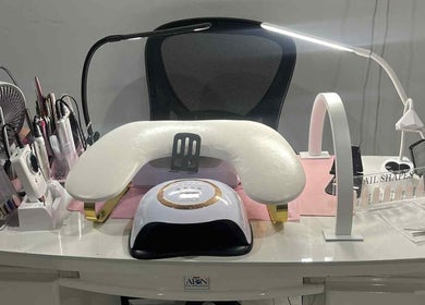 Nail station setup at Nails by Juliette in Melbourne, Victoria, AU, featuring tools and equipment.